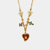 Collana in Metallo con fiori, croci e cuore sacro pendenti By Simon
