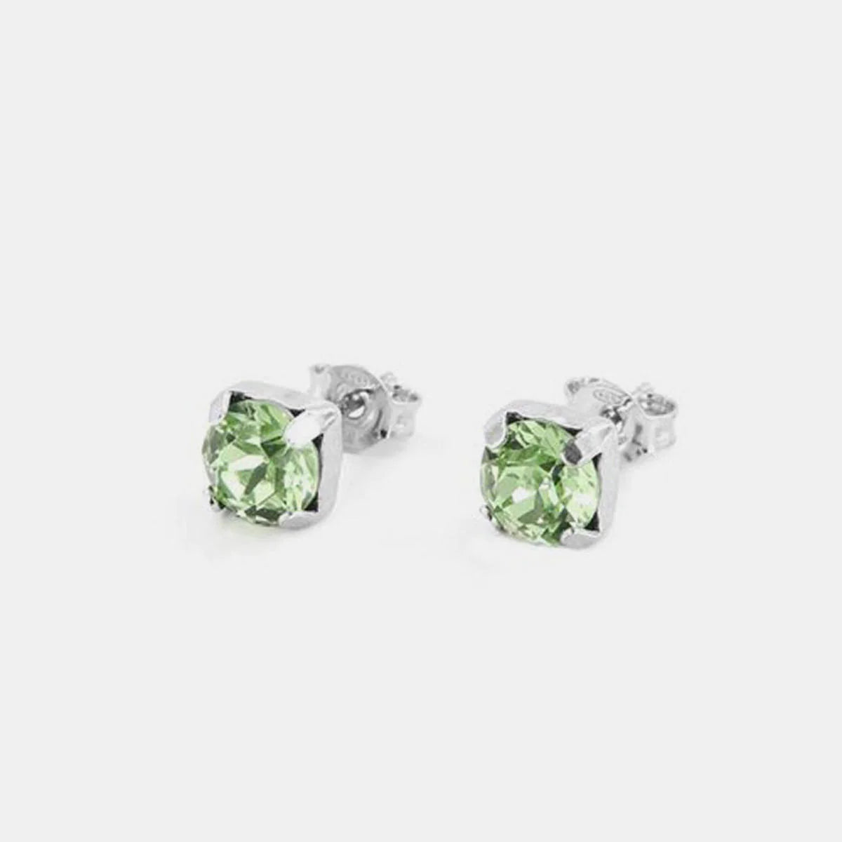 Orecchini in Argento 925 punto luce a lobo con cristallo verde